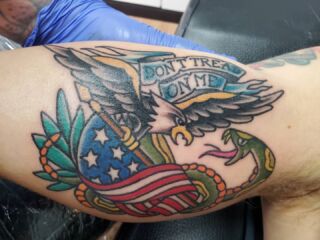 Tattoo by David Theeke