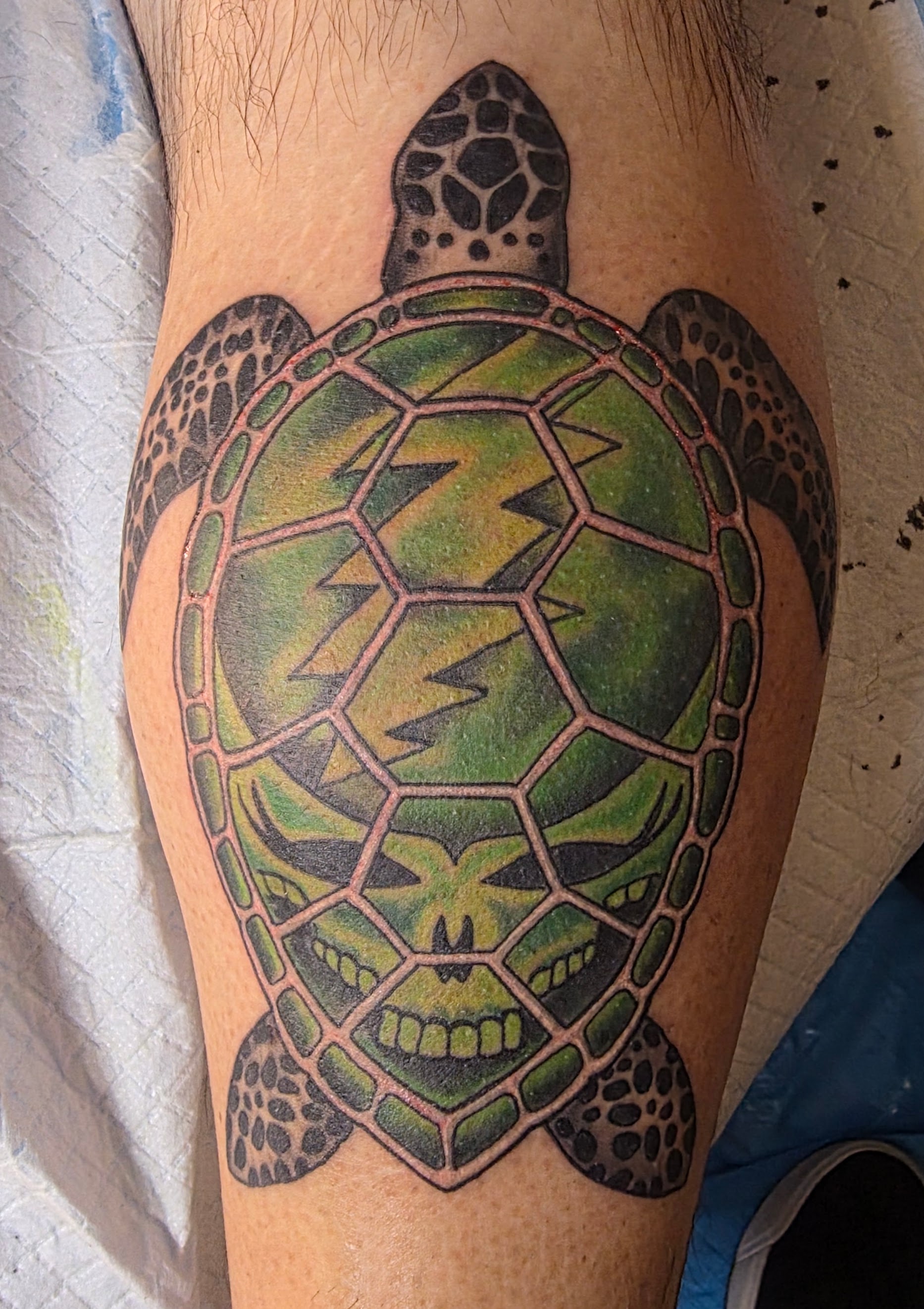 Tattoo by Eric Ebbole